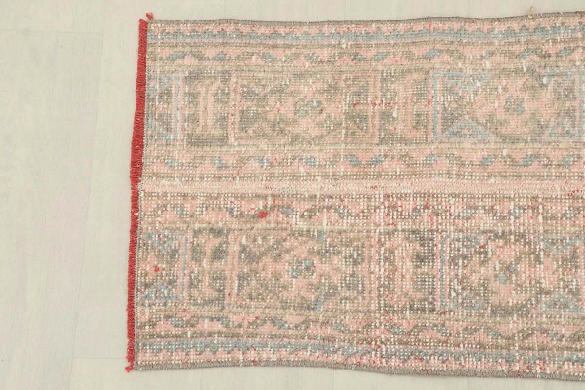Overhead view of the other end of the runner, with the subtle geometric design and rich texture.