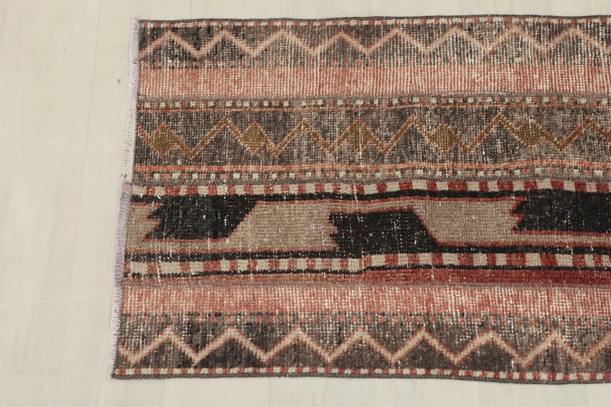 Another overhead perspective of the rug, emphasizing the unique patterns and color variations.
