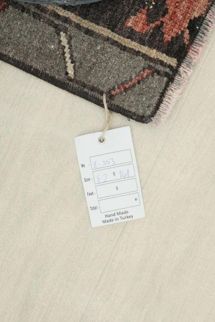 Tag displaying rug dimensions and origin, 'Hand Made in Turkey'