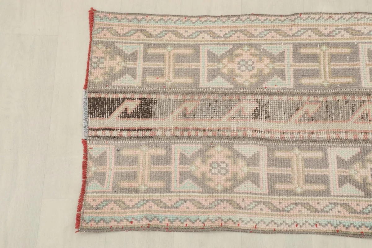 Angled view showing the runner's patterns and the subtle color shifts from the top left