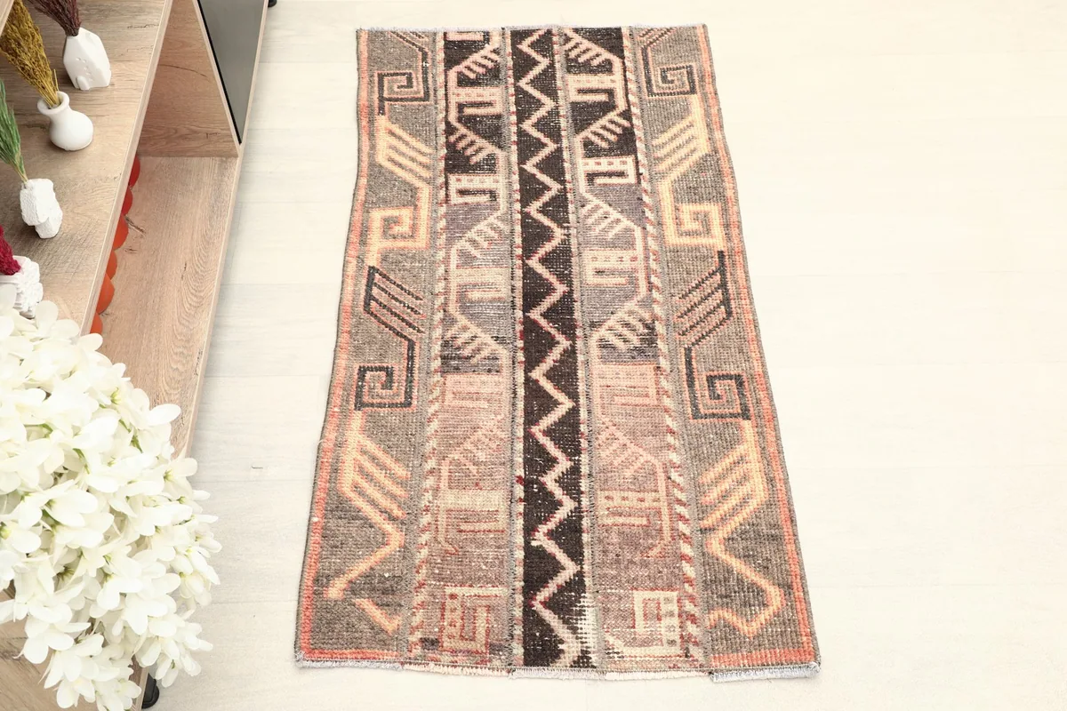 Overhead view of the vintage Anatolian rug, highlighting its full geometric design.