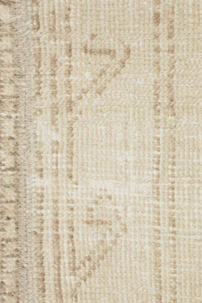 Detailed view of the specific tribal pattern and texture on the rug