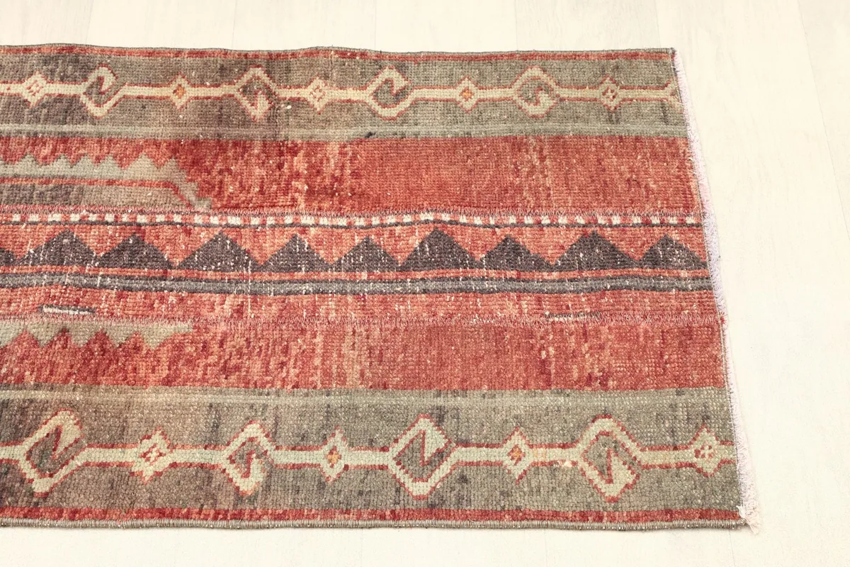 Overhead view of the other half of the rug, revealing natural color shifts