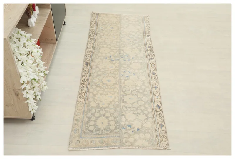 Full top view of the 2x6 beige floral geometric vintage runner on a white background.