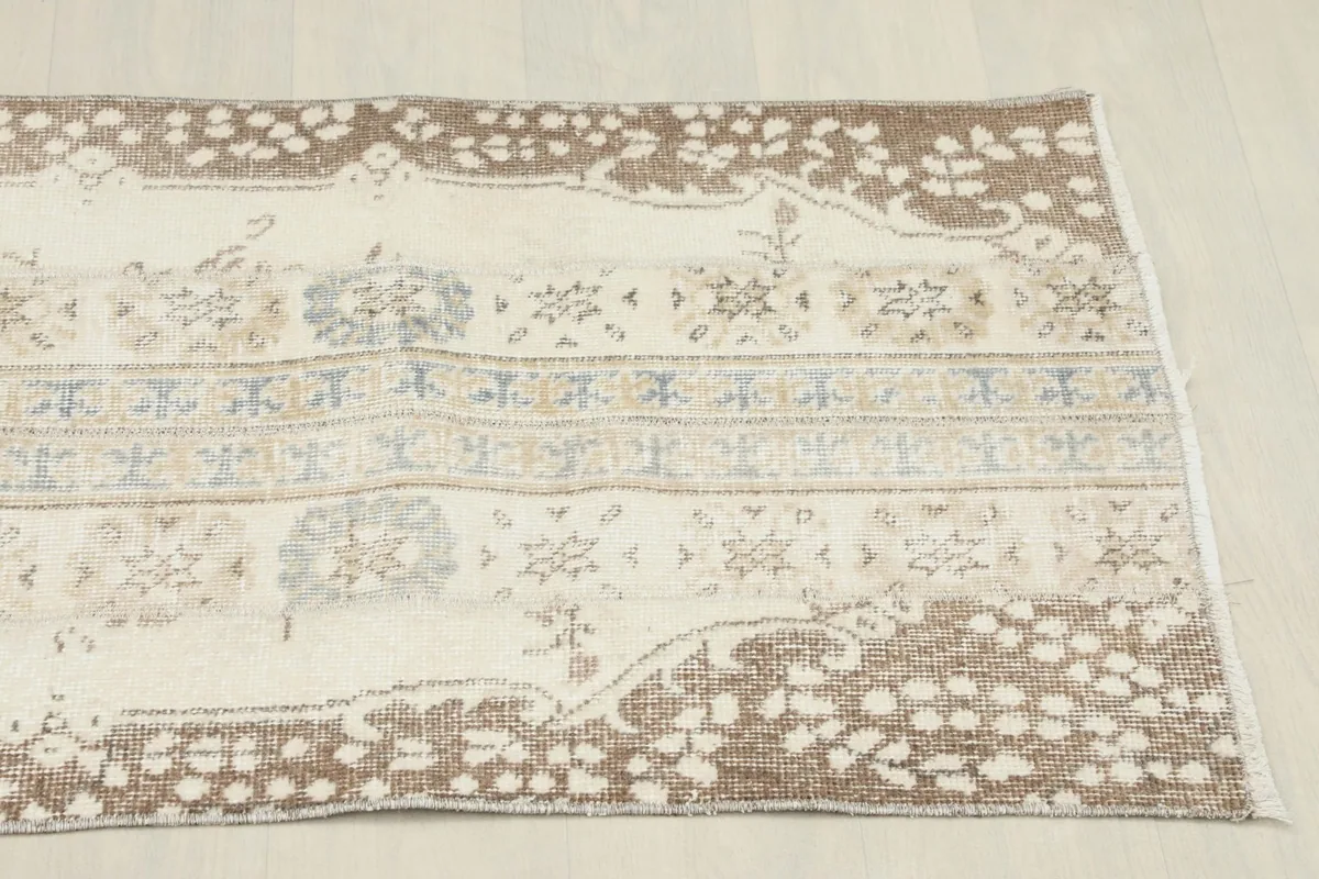 Another angled view of the runner rug, showcasing the full pattern repeat and border details.