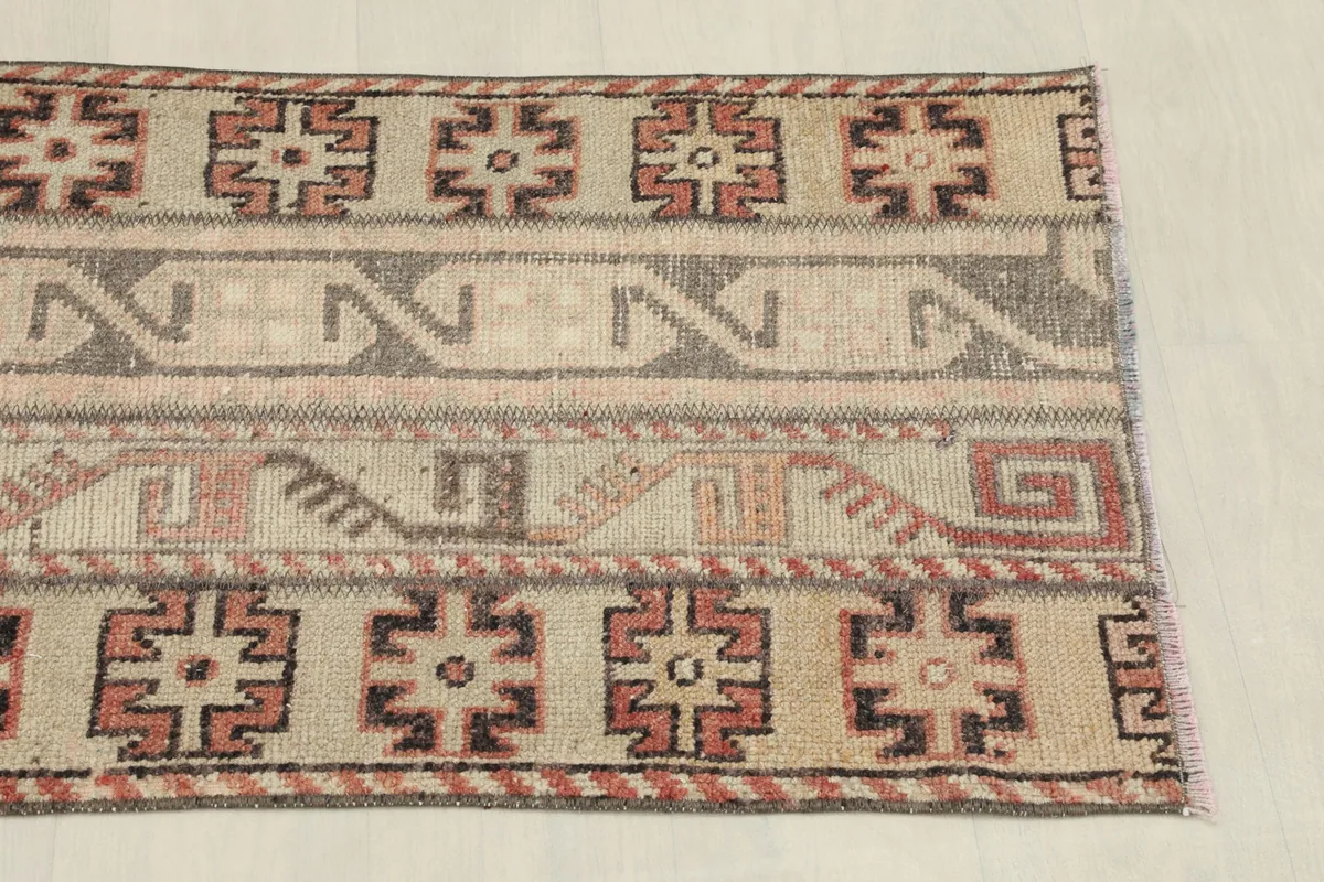 Detail view of the opposite side of the rug, showing the consistent geometric design.