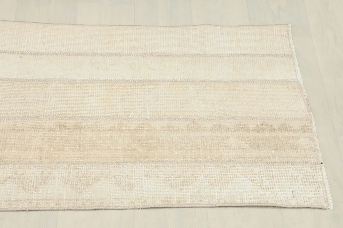 Another angled view of the rug, showing its rectangular shape and color variations