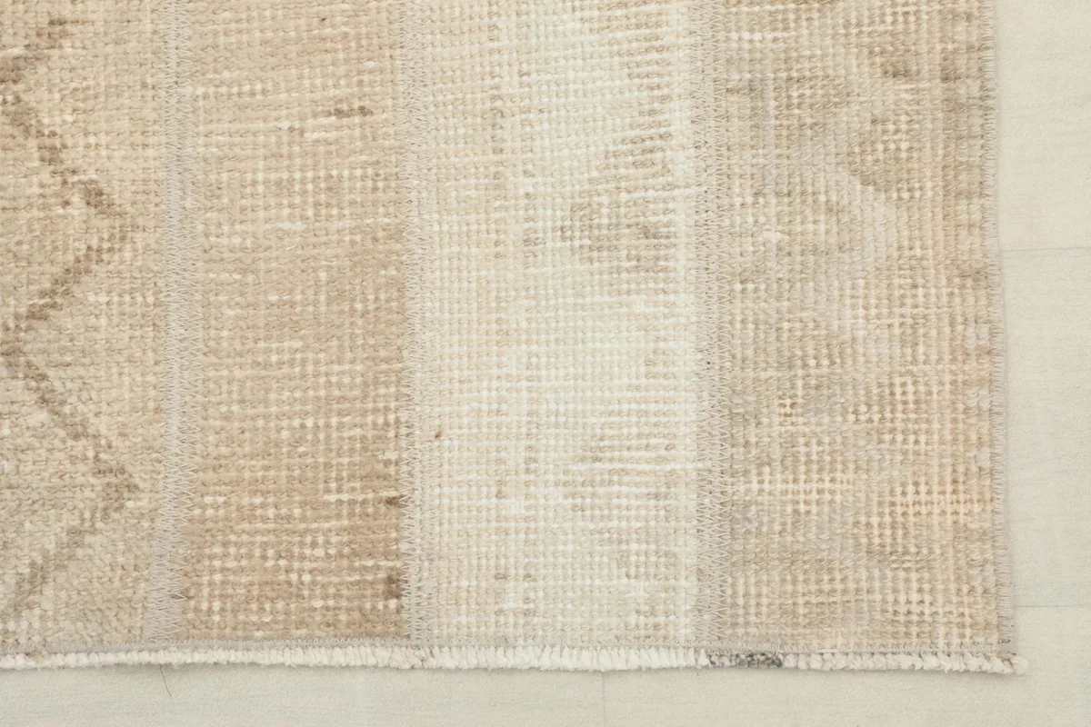 Close-up detail showing the texture and color variations in the rug's pile