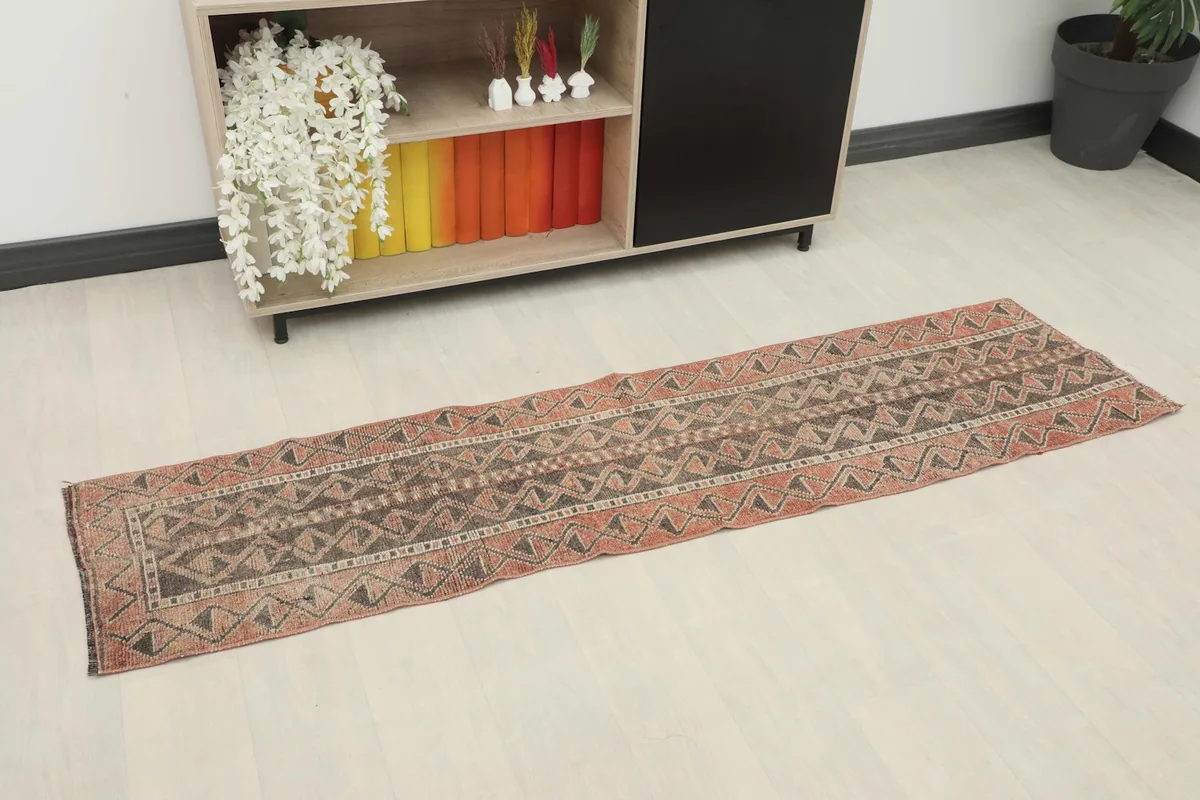 Overhead view of the runner rug showing its full length and pattern on a light floor