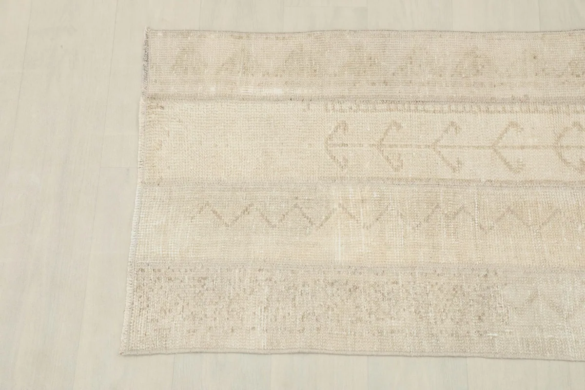 Overhead view from another angle, highlighting the rug's natural color variations