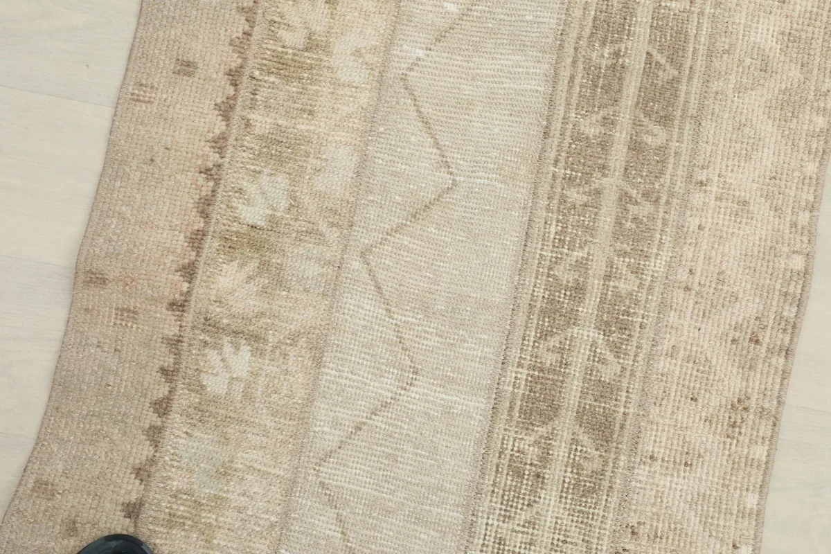 Overhead close-up of the central section, revealing the low pile and textured appearance.
