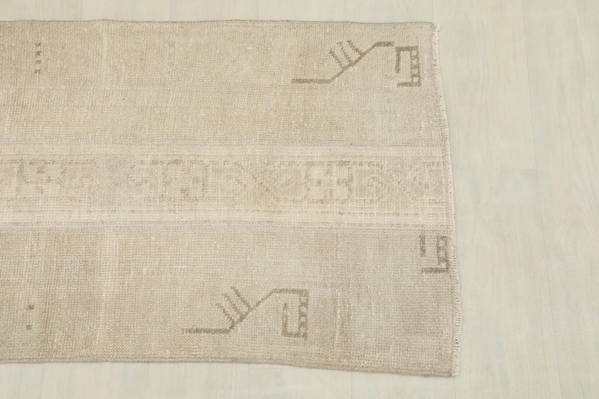 Detail of one end of the rug, highlighting the distinct tribal geometric motif