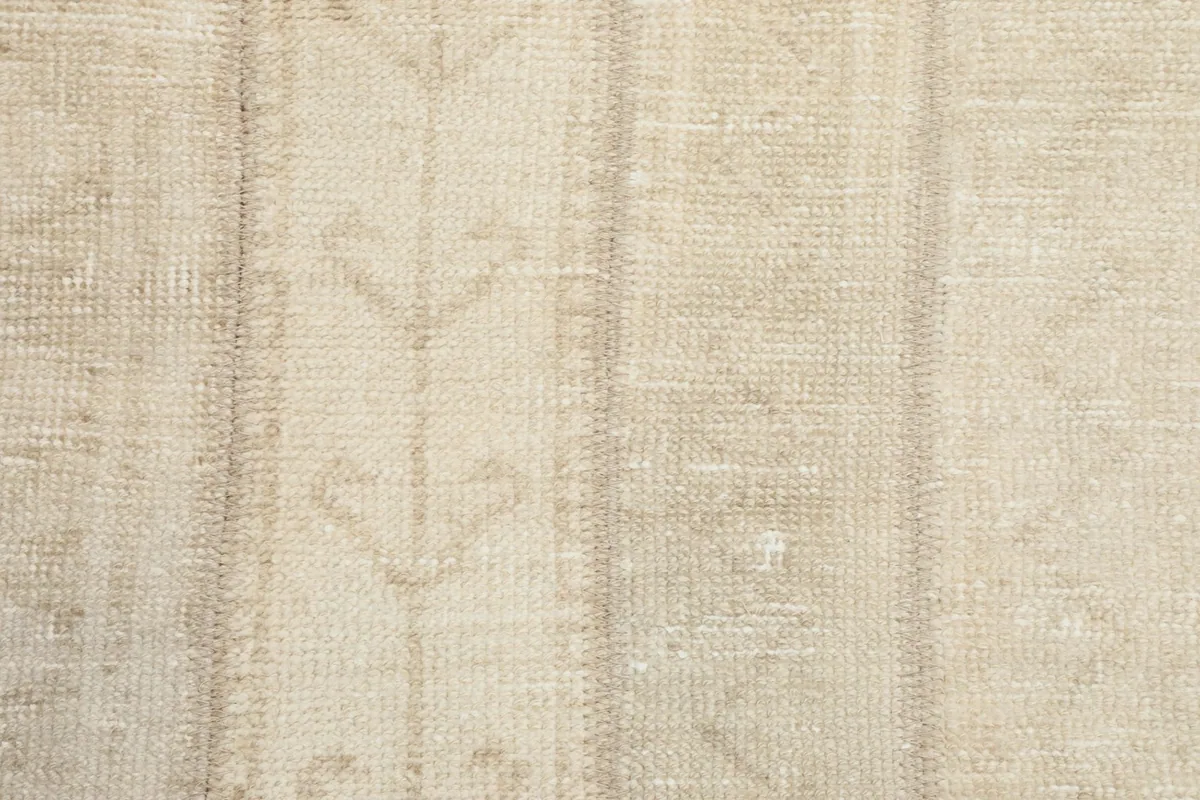 Detailed view of the wool pile and the texture of the hand-knotted construction.