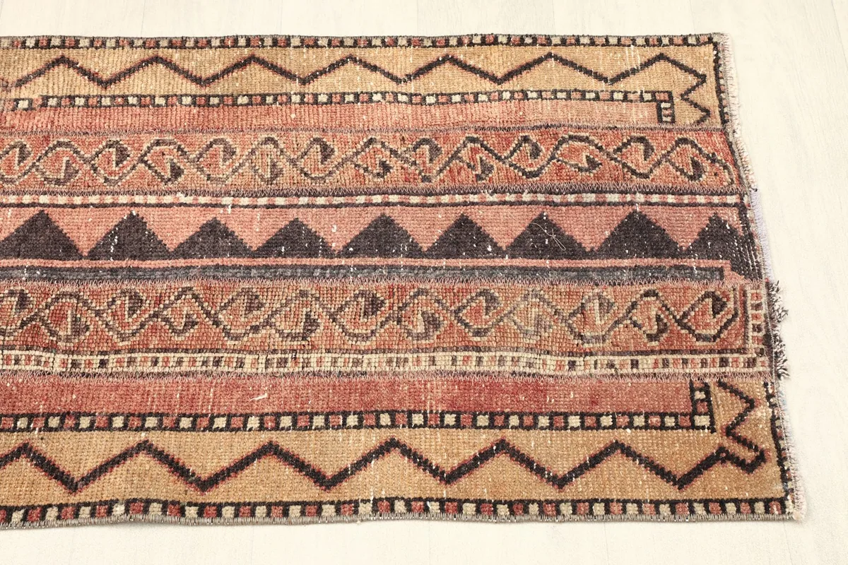 Angled view of the other end of the rug, illustrating the consistent design and texture