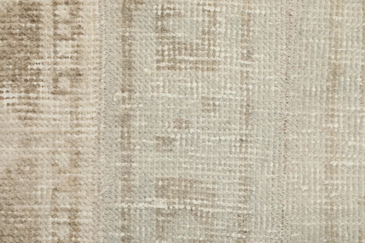 Very close view of the low wool pile, showing the texture and subtle color variations.