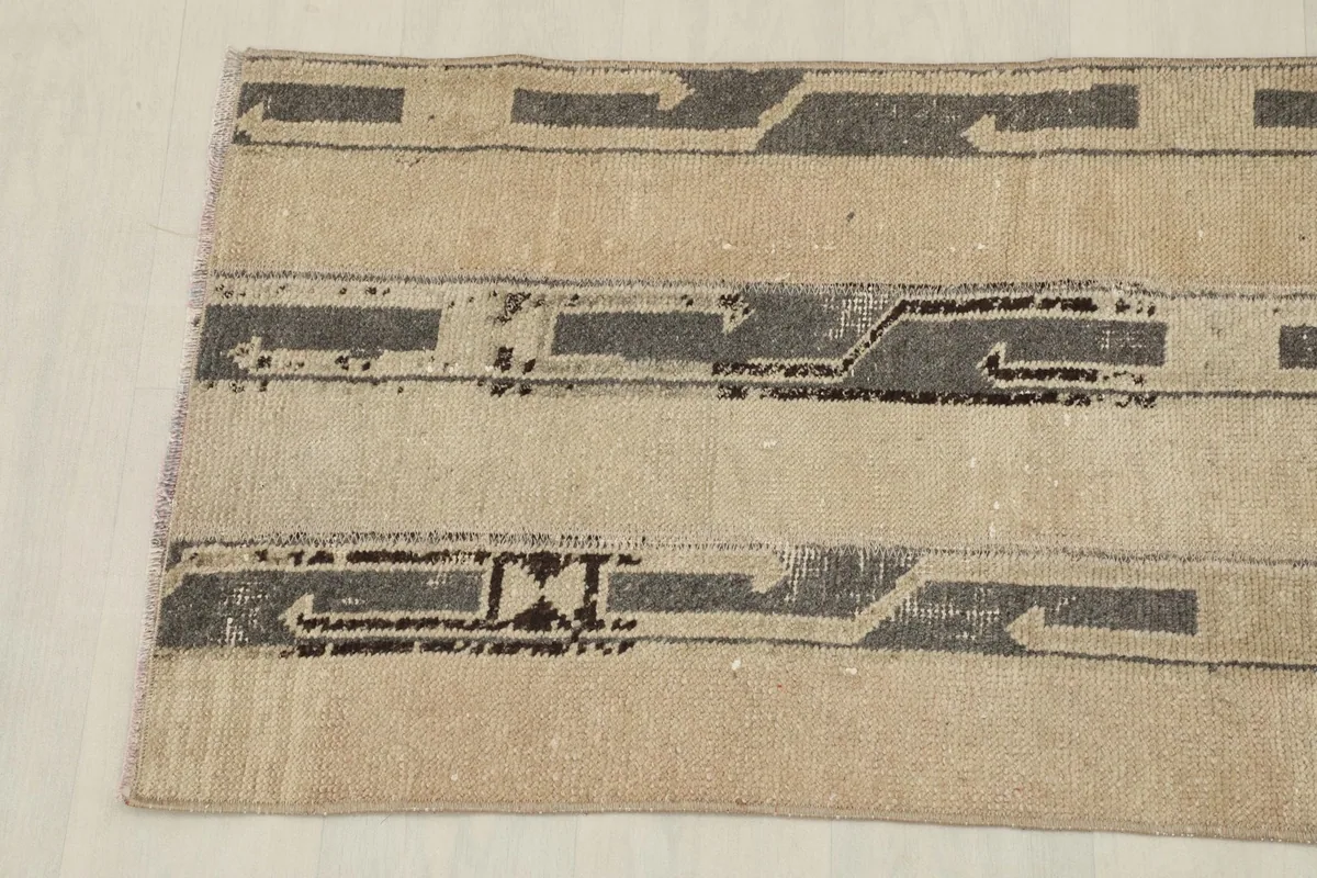 Close-up of the center section of the runner rug, showing the unique abstract design.