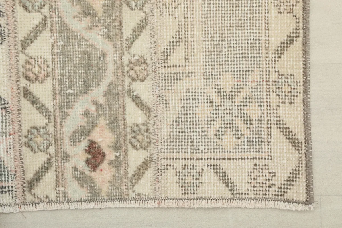 Close-up of a corner, revealing the intricate geometric motifs and weave