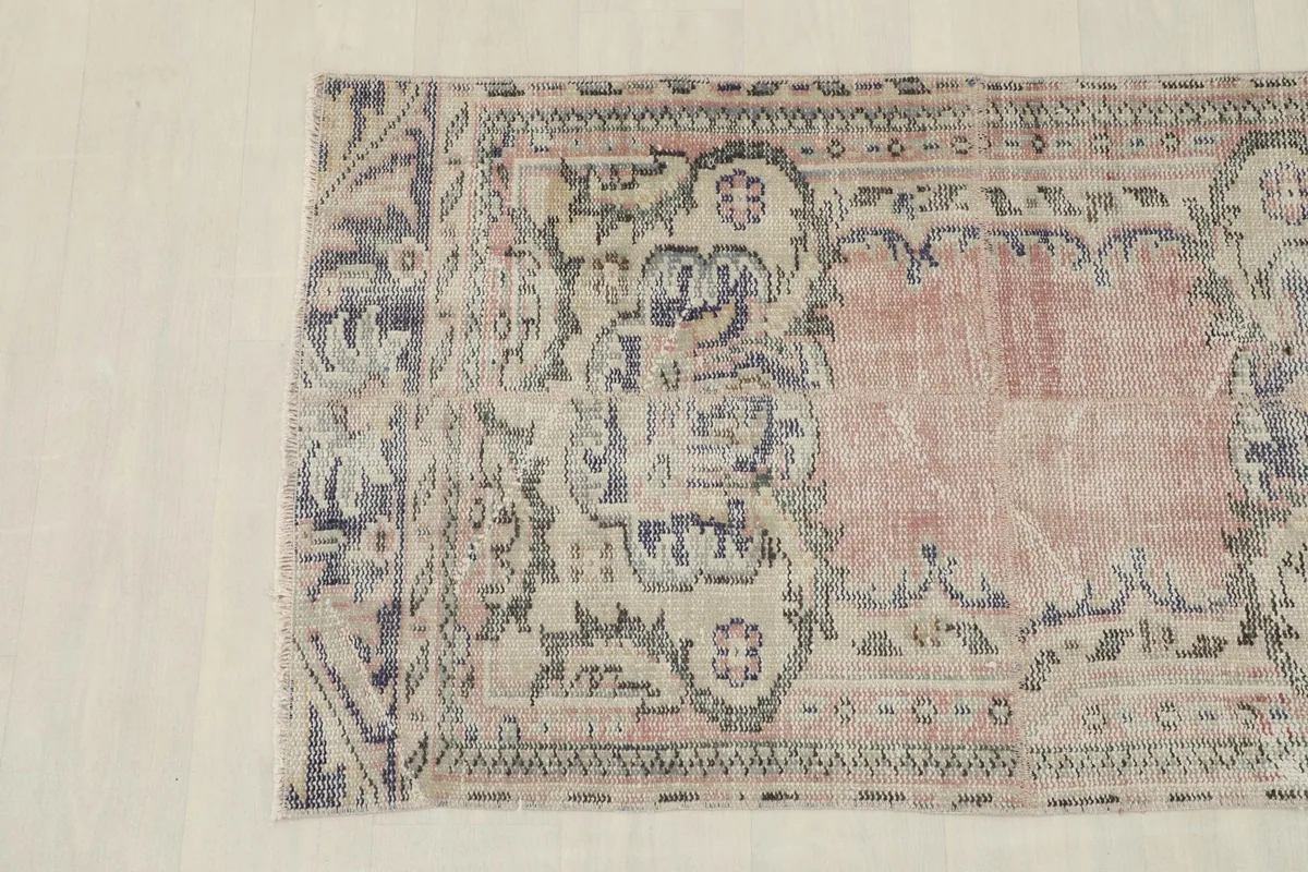 Close-up angled view of the rug's pattern and color variation
