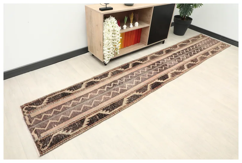 Full top view of the vintage 2x12 Anatolian runner rug with tribal geometric patterns
