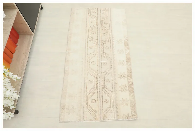 Full top view of the beige and tan vintage Anatolian area rug