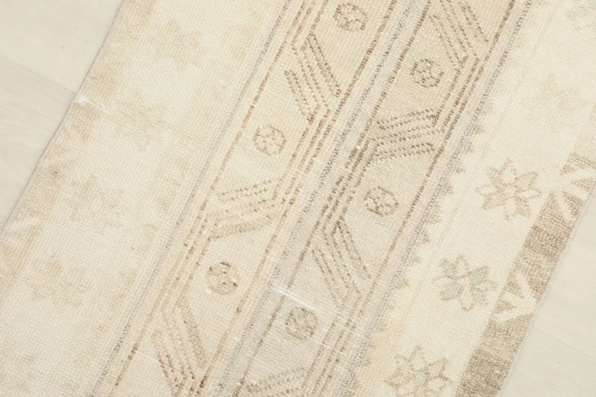 Close-up of the central geometric designs and floral elements
