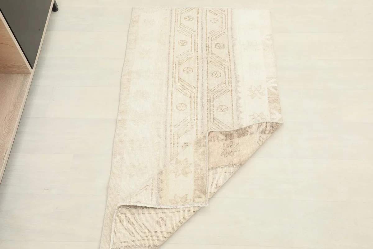 Rug partially folded, showing its flexibility and full design
