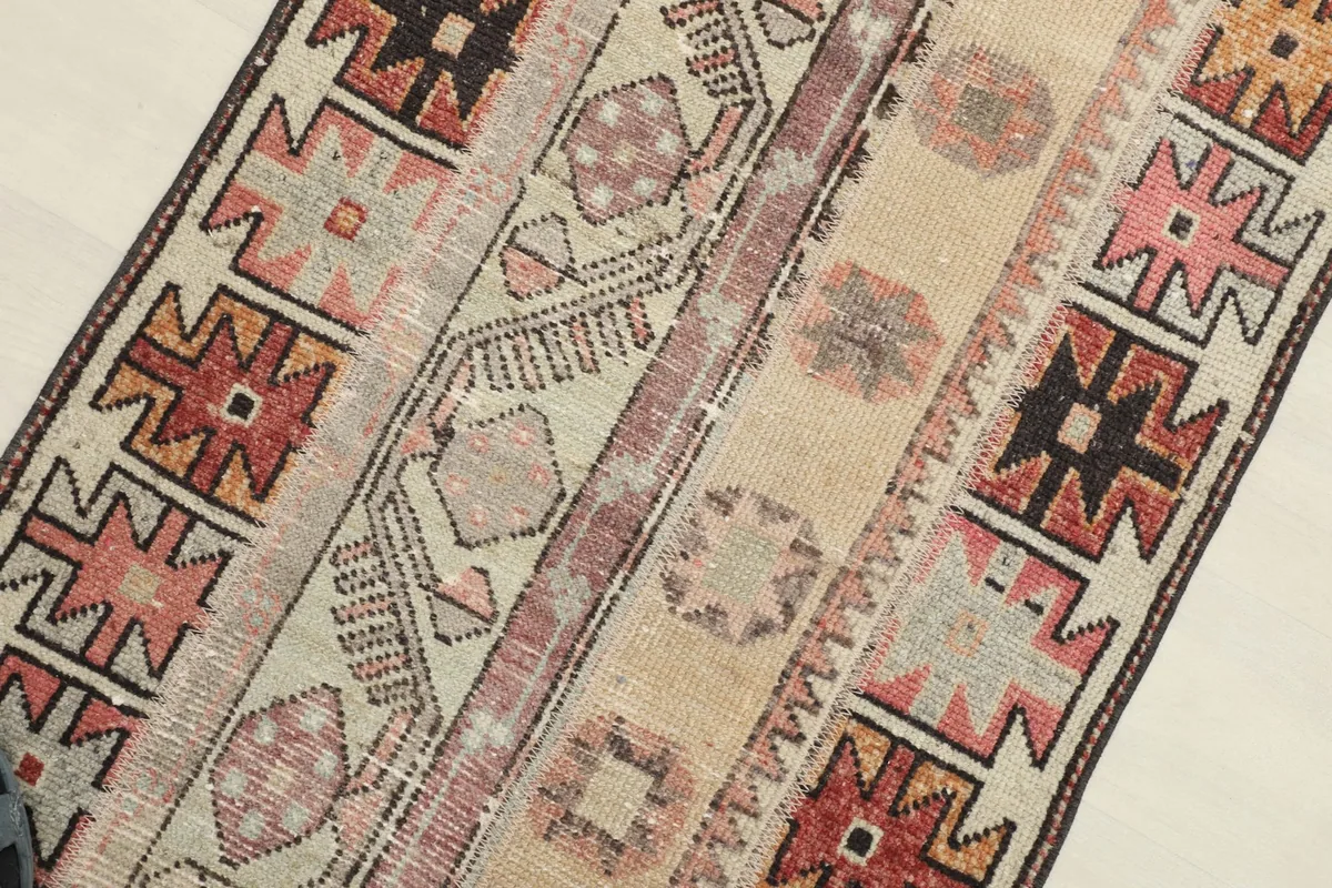 Overhead close-up of the rug's central design bands and texture
