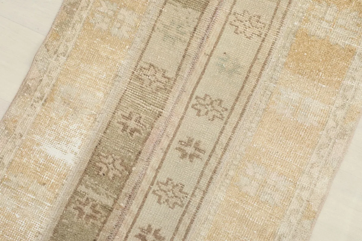 Diagonal view across the rug's surface, showing the texture and color variations