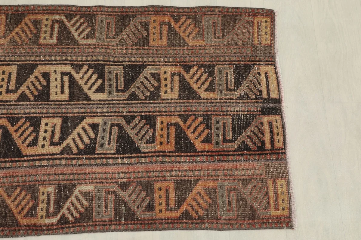 Overhead view focusing on one half of the rug, highlighting the pattern repetition