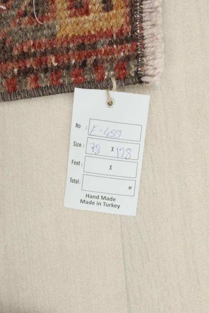 Close-up of the product tag showing the dimensions 78 x 128 cm and 'Hand Made in Turkey'