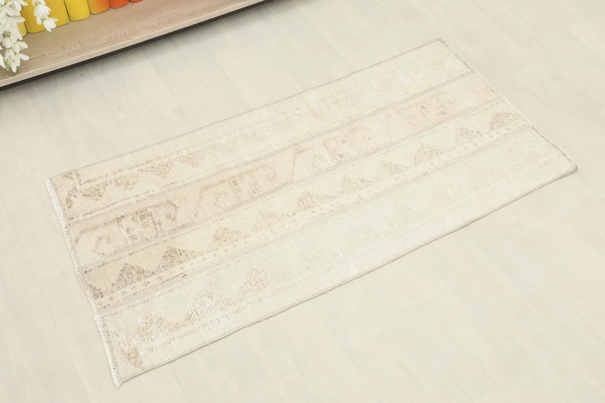 Slightly angled overhead view of the hand-knotted wool runner, highlighting its rectangular shape.