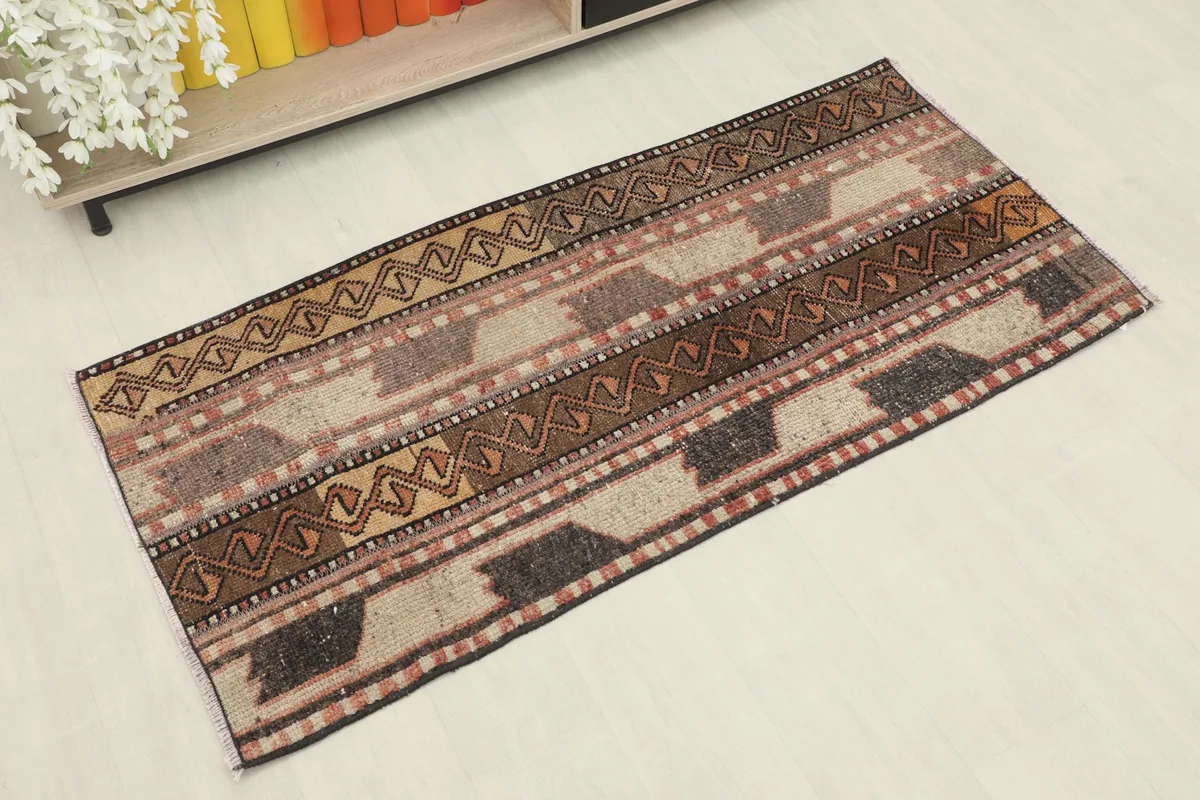 Overhead view showcasing the full length and width of the hand-knotted wool rug.