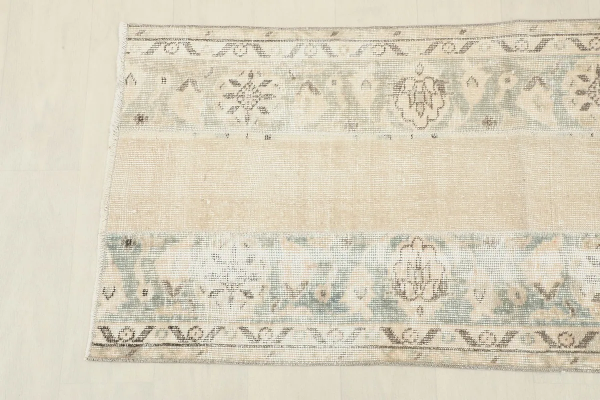 Overhead view of one end of the runner, displaying the border design and color variations.