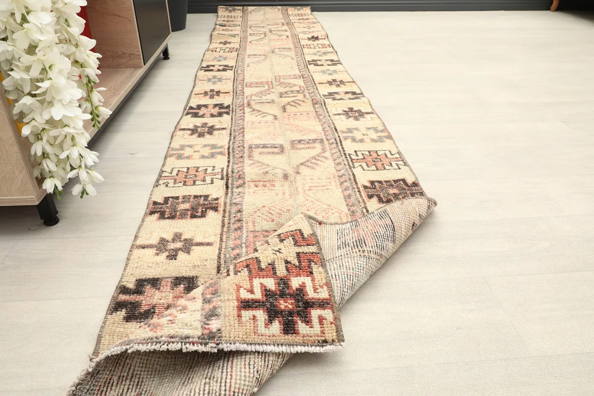 Angled view of the runner in a room, showing its length and how it lays on the floor