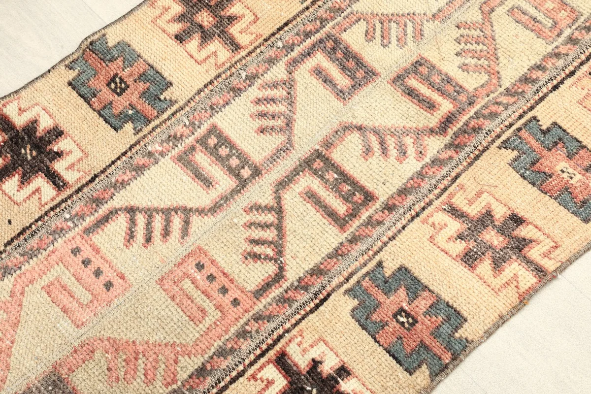 Angled detail view highlighting the intricate geometric motifs and color variations