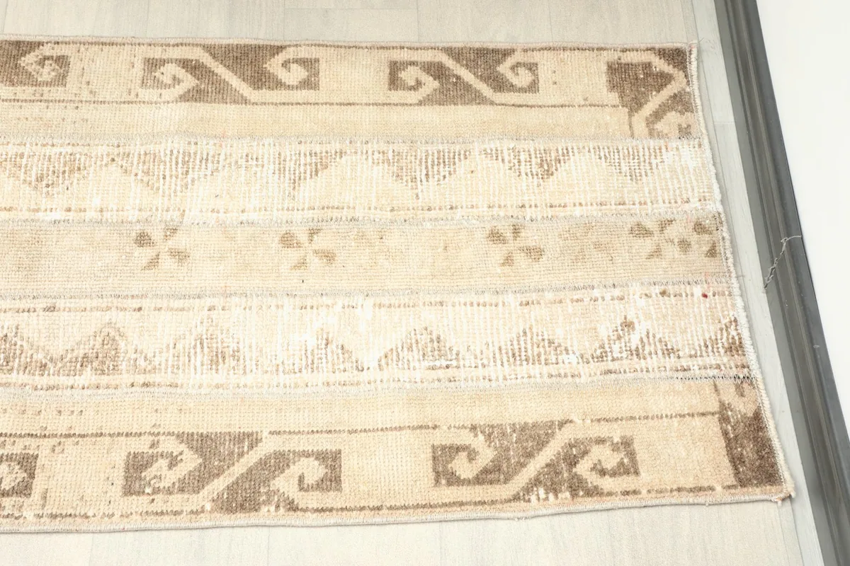 Overhead view of the other end of the runner, displaying the symmetrical tribal geometric design.