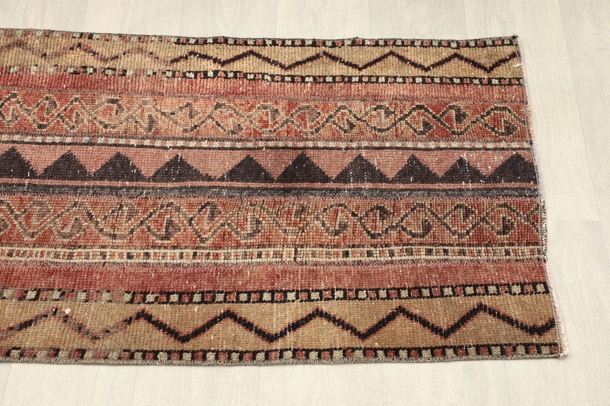 Angled shot of the other end of the runner, displaying the full range of colors and patterns.