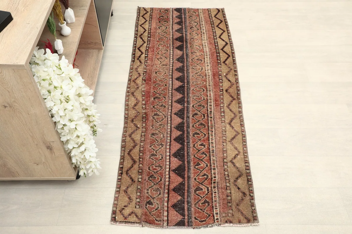 Overhead view showcasing the full length and striped geometric patterns of the Anatolian runner.