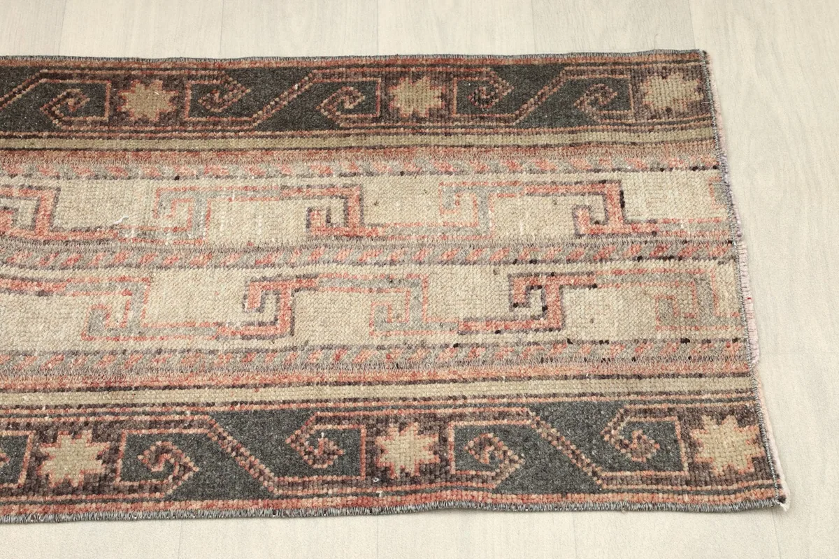 Opposite side border of the rug, showing consistent geometric and tribal elements.