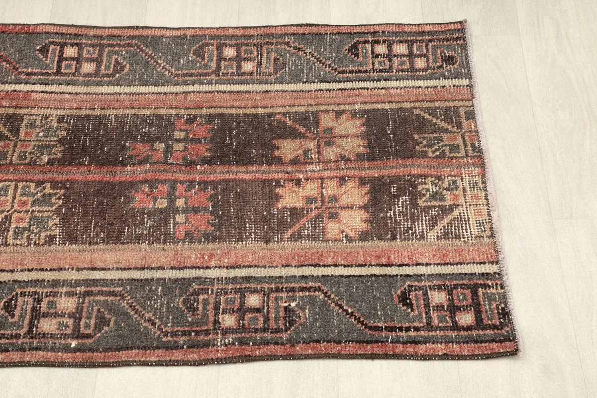 Angled shot from the opposite end, revealing the rug's overall composition and texture.