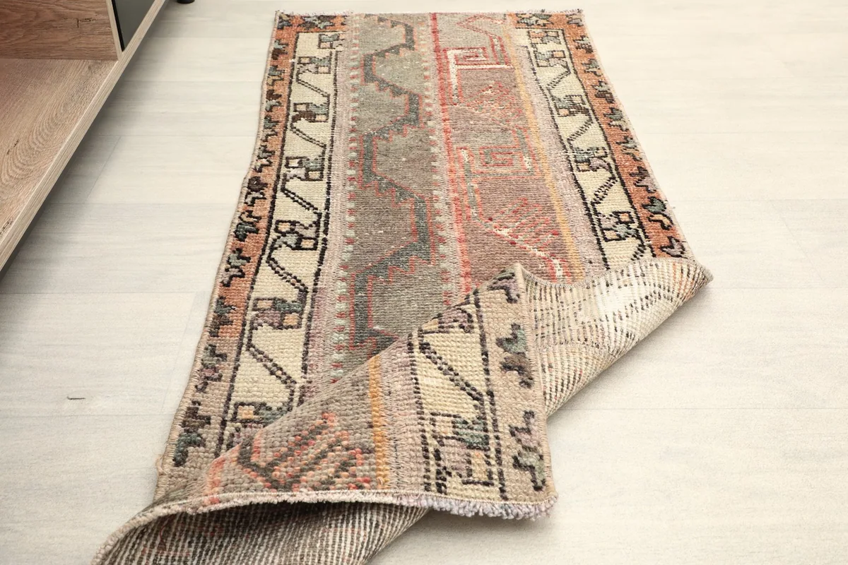 The runner partially folded to show its flexibility and thickness.