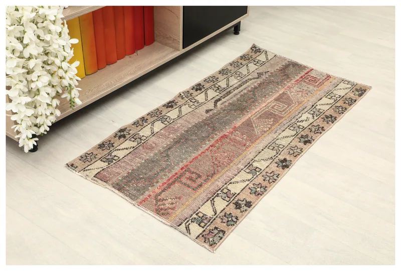 Full top view of the 2x4 vintage Anatolian patchwork rug on a white background.