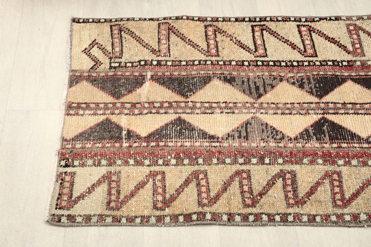 Overhead partial view from one end, showing the consistent tribal pattern and color variation