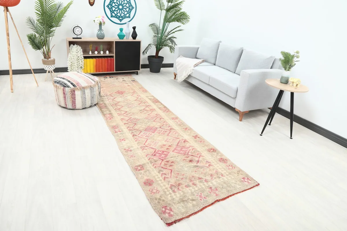 Angle view of the runner rug in a room, showing its length and pattern flow