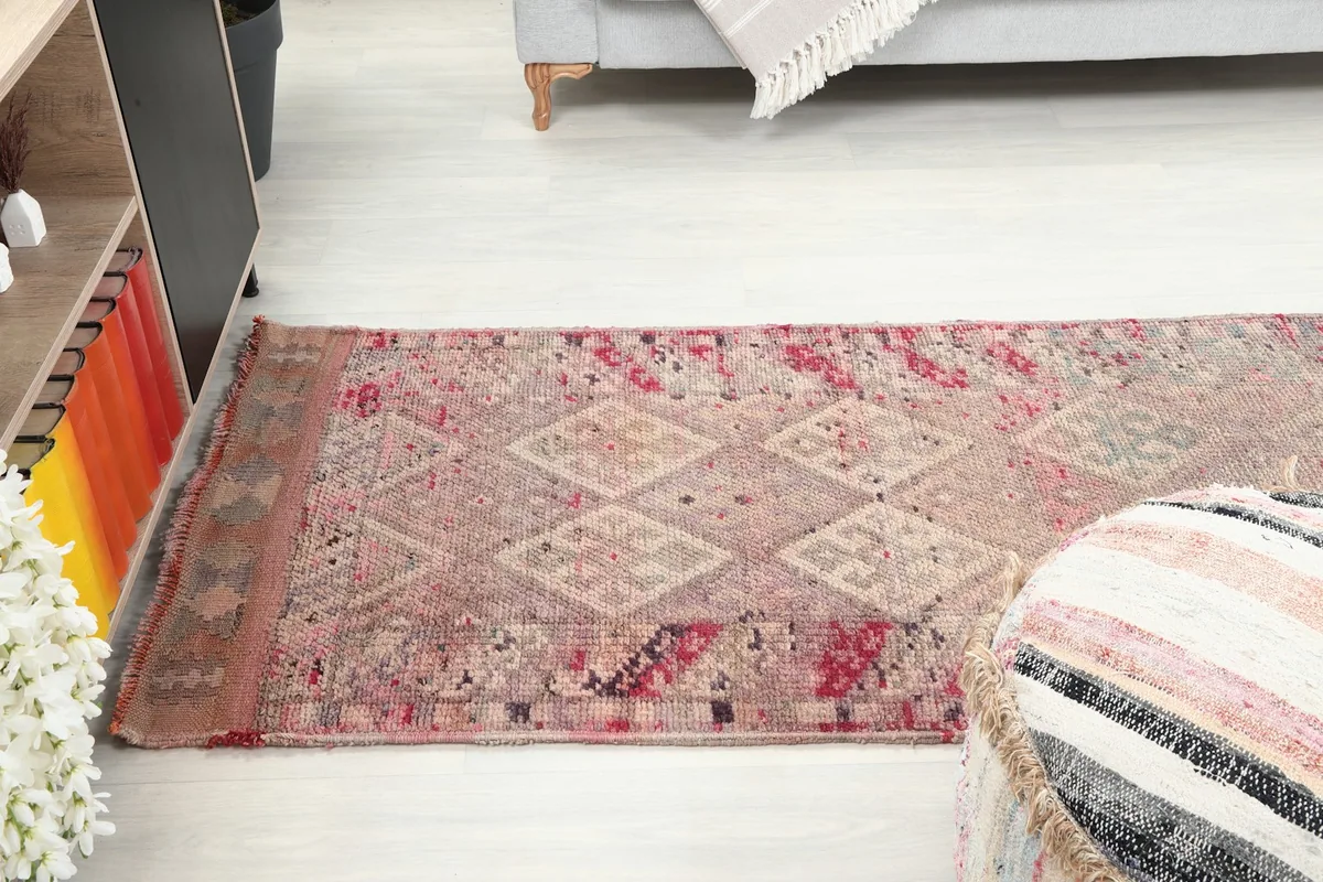 Room shot from above, showcasing the runner rug's length and its complementary colors with furniture.