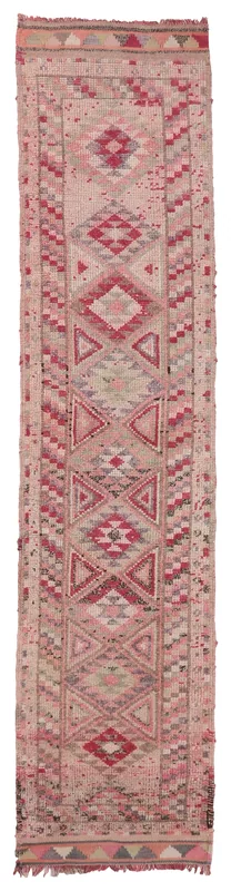Full overhead view of the 2'7" x 11'3" vintage Anatolian runner with rose and beige geometric patterns