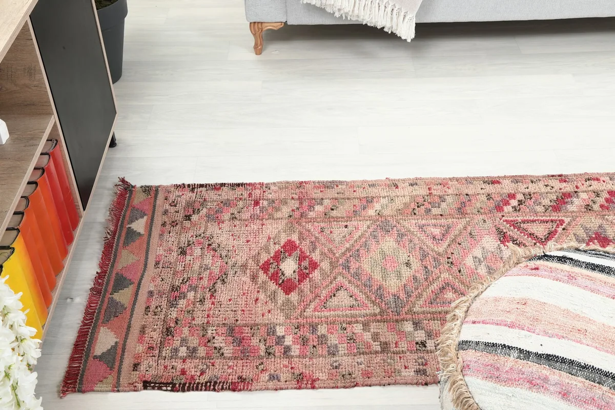 Wide shot of the runner rug extending into a room, demonstrating its length