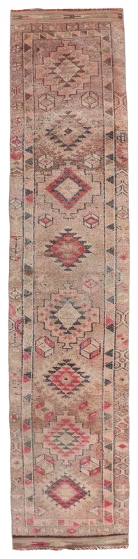 Full top view of the 2'9" x 12'10" beige and red geometric Anatolian runner rug on a white background