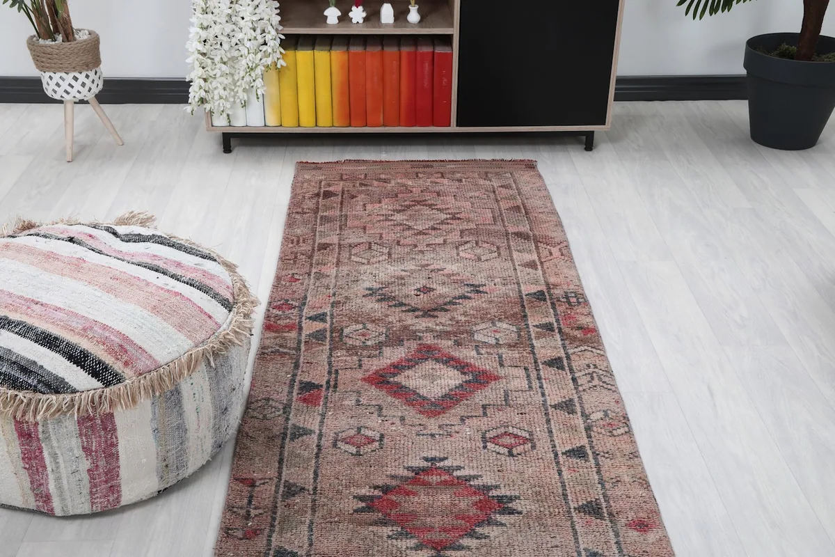 Overhead view of the runner rug in a room, emphasizing its length and how it defines the space