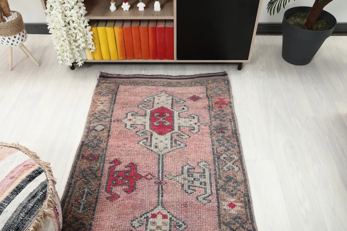 Overhead view of a section of the runner rug in a room, showing its placement near furniture.